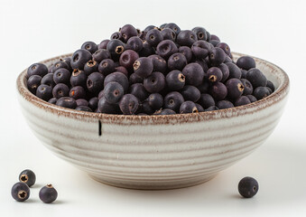 Sun-dried blueberries in a White Ceramic Bowl isolated on a white background,  