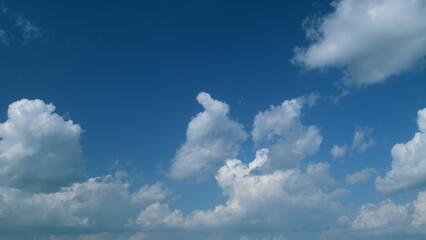 Majestic amazing sky. Blue sky white clouds. Clouds rolling under blue sky. Timelapse.