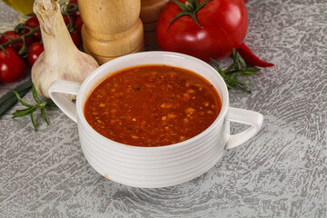 Hot tomato soup with diced chicken