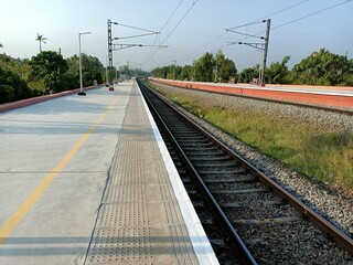 Fototapeta premium A railway track or railroad track, also known as a train track or permanent way, is the structure on a railway or railroad consisting of the rails, fasteners, railroad ties and ballast.