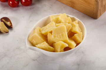 Crushed parmesan cheese in the bowl