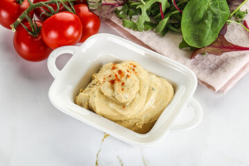 Creamy hummus in the bowl