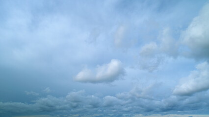 Clouds with blue light blue sky in horizon. No birds and free of defects. Cloudscape nature...