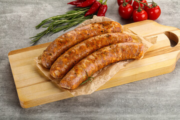 Raw sausages with spices and herbs