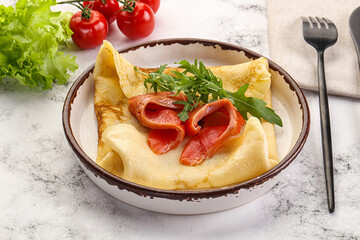 Russian pancake with salmon fish