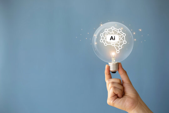 AI, Machine learning, Hand holding light bulb with virtual Artificial Intelligence and virtual digital brain. AI Technology.Science and artificial intelligence technology, innovation for futuristic.