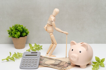 老人とお金で老後資金のイメージ