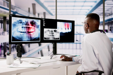 Dentist Doctor Looking At Teeth Xray