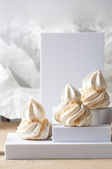 Baked meringue cookie on the podium, sweet modern image