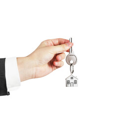 A hand holding a key with a house-shaped keychain, isolated on a white background, symbolizing home ownership