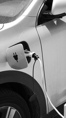 Electric Car Charging Closeup Monochrome Image