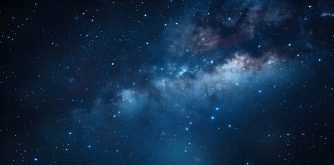 Blue night starry sky, space background. Wallpaper with a serene blue night sky