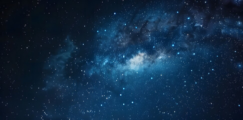Fototapeta premium Blue night starry sky, space background. Wallpaper with a serene blue night sky