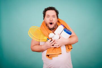 Funny fat man and sporty lifestyle. Fitness bad habits. Blue background.