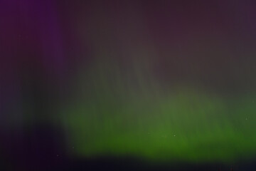 CARNIKAVA, LATVIA. 10th May 2024. Selective focus photo. Impressive northern lights, aurora...