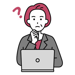 考えるノートパソコンで仕事をしている年配のスーツの女性