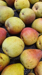 Close up pile of fresh guavas placed together in local market as a background.	