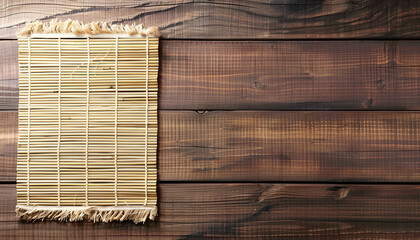Bamboo mat on wooden table, top view. Space for text