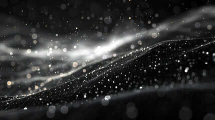 Black and white image of a dark background with water drops.