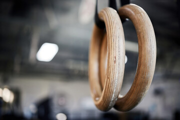 Gym, gear and rings for exercise, gymnastic and equipment for strong challenge. Functional fitness,...
