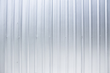 White corrugated iron metal sheet texture surface. Steel silver background.