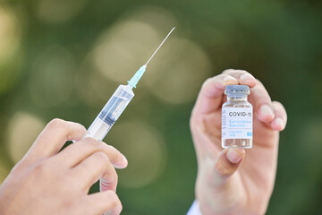Hands, doctor and syringe or vial in outdoor, medicine and pharmaceutical injection for healthcare....