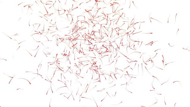 Saffron threads falling on a Bright surface
