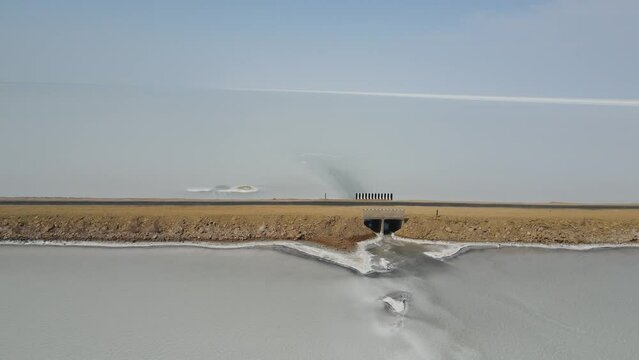 aerial drone footage of a mystic sunrise in the village covered in fog