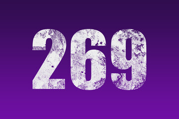 flat white grunge number of 269 on purple background.