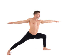 Obraz premium Sports and healthy lifestyle. An attractive man is doing yoga and pilates. White background.