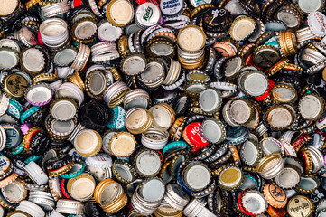 Istanbul, Turkey. 28 april 2024. Crown corks of soda and beer bottles close-up. Bottle lid caps...