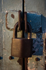 old rusty padlock on the door dirty high-resolution lock key