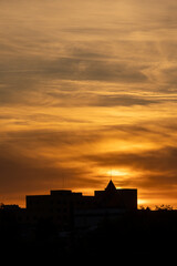 Obraz premium silhouettes at sunset in the Madrid neighborhood called Carabanchel
