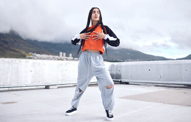 Woman, hip hop and outdoor dancing in city for freedom with streetwear fashion, talent and movement...