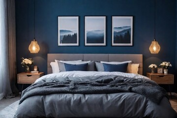 Cozy bedroom interior design with mock-up poster frame, blue and grey bed, bedside table with lamp, and blue wall.