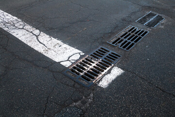 Drain grates on the road.