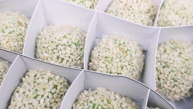 Mochi cake with sesame flavor. Mochi is made from sticky rice which is finely ground and then shaped into rounds and flavored