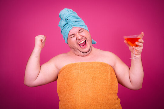 Early morning and preparation for the party. Funny fat man after a shower.