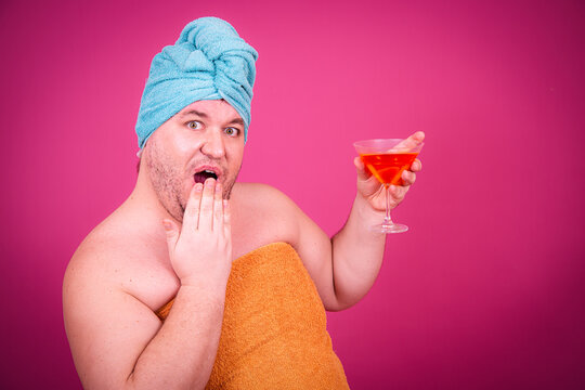 Early morning and preparation for the party. Funny fat man after a shower.