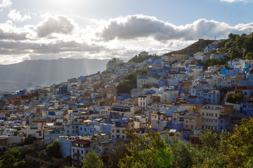 Fototapeta premium Chefchaouen morocco blue city sun set