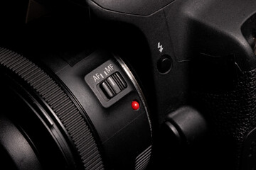 Photography detail black digital camera lens with different buttons