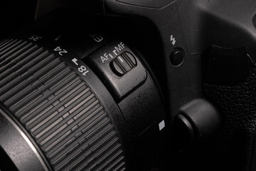 Photography detail black digital camera lens with different buttons
