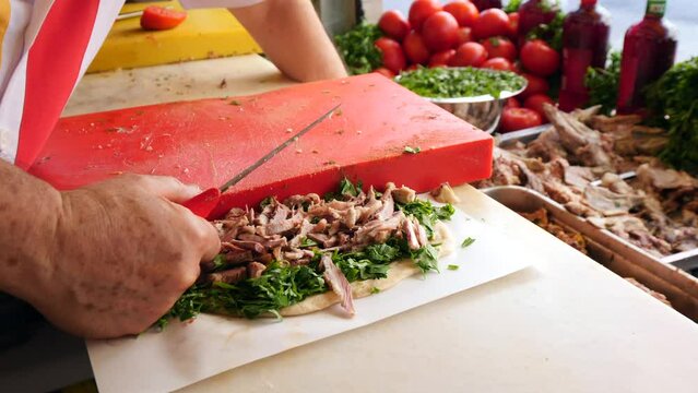 Traditional Turkish Offal Food Kelle Sogus, boiled beef meat, tongue, cheek. Turkish street food.