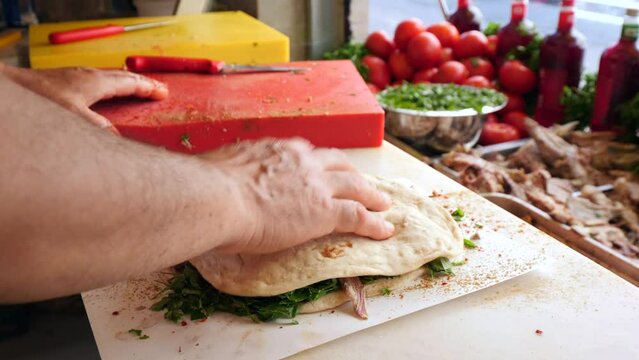 Traditional Turkish Offal Food Kelle Sogus, boiled beef meat, tongue, cheek. Turkish street food.