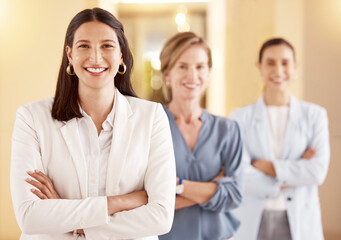 Smile, crossed arms and portrait of business women in office for diversity, unity and staff at...