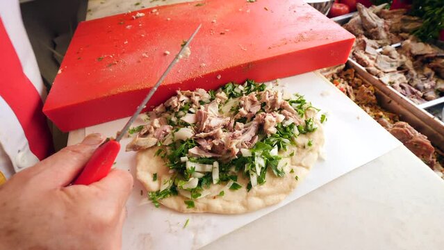 Traditional Turkish Offal Food Kelle Sogus, boiled beef meat, tongue, cheek. Turkish street food.