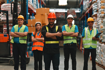 Multiracial Warehouse workers logistic team working in warehouse for industry business or shipping...