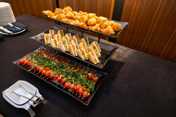 Catering Display with Croissants and Sandwiches