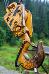 Metal hook of the industrial crane.