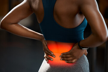 Back pain, red and person hands for fitness injury, risk or workout tension in gym with overlay. Medical, spine and athlete massage for body strain in training, sports or exercise with inflammation